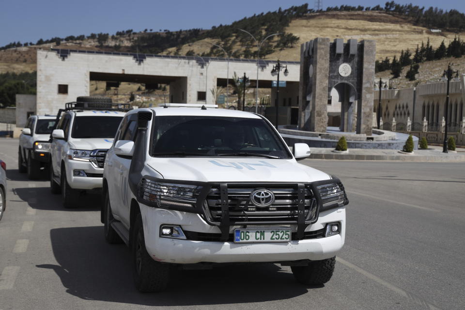 A United Nations convoy visits rebel-held northwestern Syria ahead of the annual fundraising conference organized by the European Union for the war-torn country, as they cross Bab al-Hawa border crossing with Turkey, in Syria's Idlib province, Tuesday, May 14, 2024. Syria's devastating civil war, now in its 14th year, remains largely frozen and so are efforts to find a viable political solution to end it, while millions of Syrians have been pulled into poverty, and struggle with accessing food and health care as the economy deteriorates across the country's front lines. Aid organizations are making their annual pitches to donors ahead of a fundraising conference in Brussels for Syria on Monday, May 27. (AP Photo/Omar Albam)