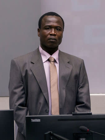 Dominic Ongwen, a former senior rebel commander from the Lord's Resistance Army in Uganda, stands in the courtroom of the International Criminal Court (ICC) during the confirmation of charges in The Hague, the Netherlands January 21, 2016. REUTERS/Michael Kooren/File Photo