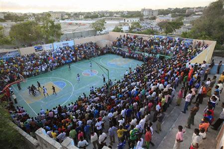 Basketball fans gather at Lujino stadium as they watch the final between Hegan and Horseed in Mogadishu October 11, 2013. REUTERS/Omar Faruk