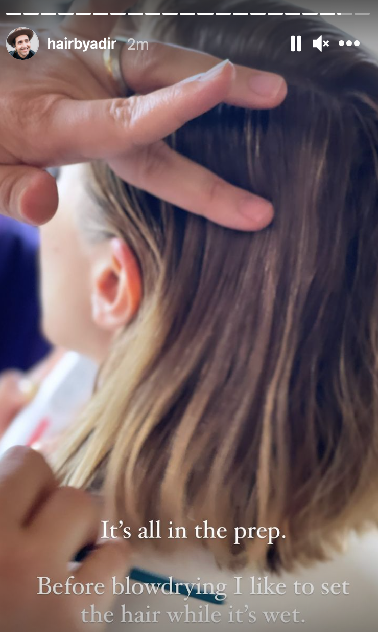 A close up of the back of Elizabeth Olsen's head