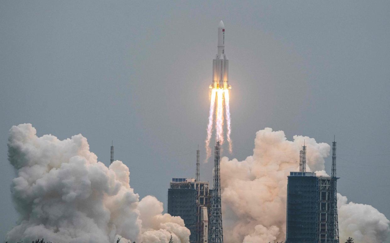 A large segment of the Long March 5B rocket re-entered the Earth's atmosphere and disintegrated over the Indian Ocean - AFP