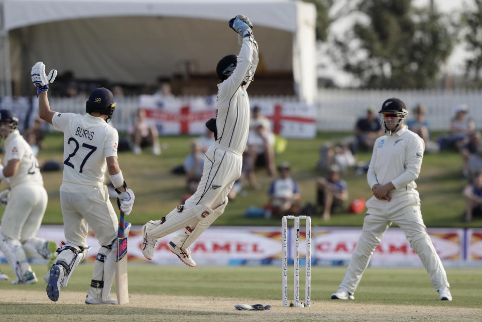 New Zealand's BJ Watling leaps to catch the ball during play on day four of the first cricket test between England and New Zealand at Bay Oval in Mount Maunganui, New Zealand, Sunday, Nov. 24, 2019. (AP Photo/Mark Baker)