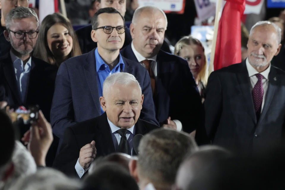 Poland's conservative ruling Law and Justice party leader Jaroslaw Kaczynski, center, speaks to supporters during the final campaign rally ahead of key parliamentary elections, in Sandomierz, Poland, on Friday, Oct. 13, 2023. At stake in Sunday's vote are the health of the nation's democracy, strained under the ruling conservative Law and Justice party, and the foreign alliances of a country on NATO's eastern flank that has been a crucial ally to Ukraine. The main challenger is centrist Civic Coalition. (AP Photo/Czarek Sokolowski)