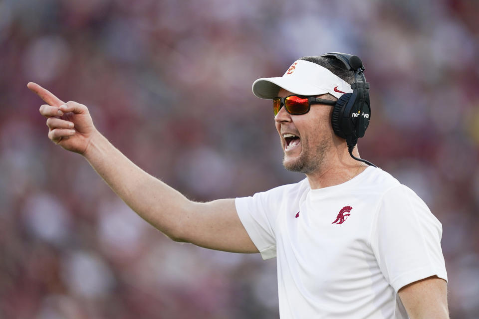 Southern California head coach Lincoln Riley gestures during the first half of an NCAA college football game against Utah, Saturday, Oct. 21, 2023, in Los Angeles. (AP Photo/Ryan Sun)