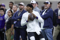 Washington quarterback Michael Penix Jr. looks to throw during the team's NFL football pro day Thursday, March 28, 2024, in Seattle. (AP Photo/John Froschauer)