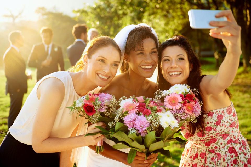 <p>A lot of time, energy and money goes into hiring the perfect wedding photographer, and <a href="https://www.goodhousekeeping.com/life/g19504286/wedding-etiquette-rules/?slide=10" rel="nofollow noopener" target="_blank" data-ylk="slk:your selfie in the background;elm:context_link;itc:0;sec:content-canvas" class="link ">your selfie in the background</a> is not welcomed. If you do have your phone out at the ceremony, Kimberly N. Rhode, owner of <a href="https://hitched-events.com/" rel="nofollow noopener" target="_blank" data-ylk="slk:Hitched Events;elm:context_link;itc:0;sec:content-canvas" class="link ">Hitched Events</a>, says to "save selfies for the dance party and leave the important pictures to the pros."</p>