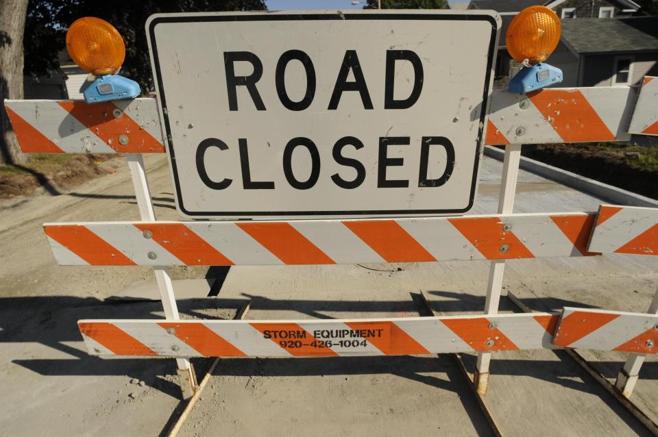 Road closed sign.