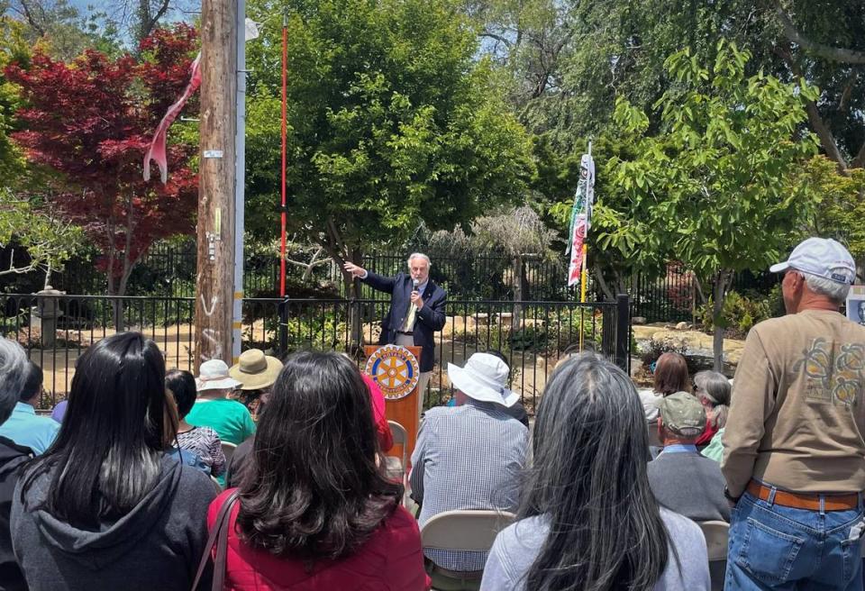 Eto family friend and Rotary Club member Jim Brabeck spoke during the ceremony on May 12 at Eto Park. 