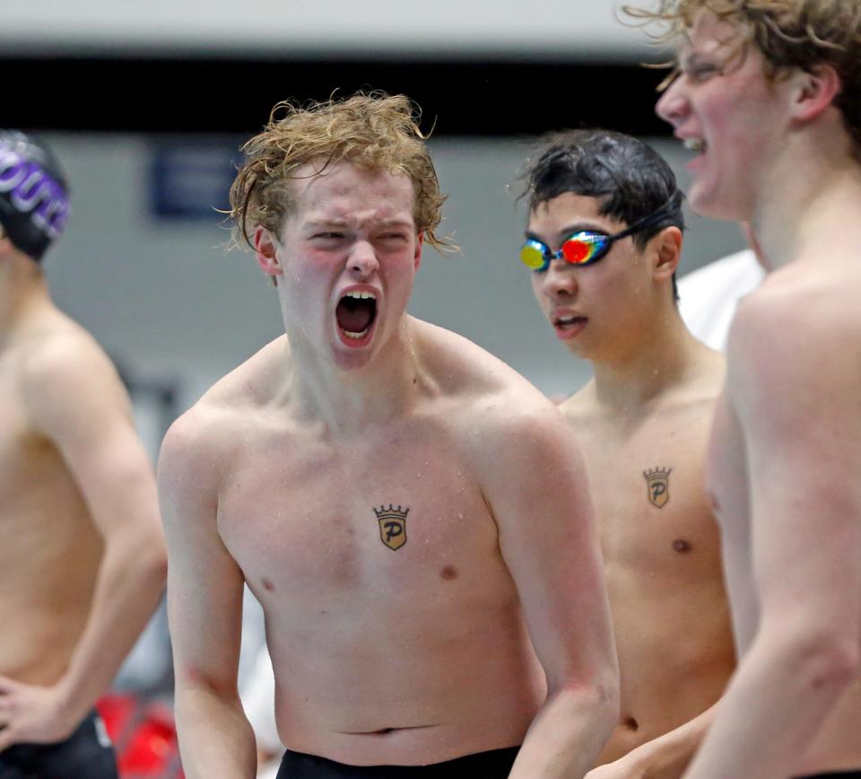 Penn sophomore Matthew Weeks reacts after his team clinched second place in the team standings at the IHSAA boys swimming state championship meet Saturday, Feb. 24, 2024, at the IU Natatorium in Indianapolis.