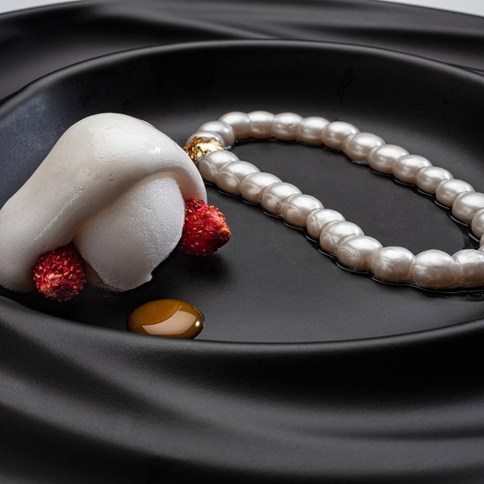 Lychee pearl necklace, one of Disfrutar's 30 courses. — Picture courtesy of Disfrutar Bcn