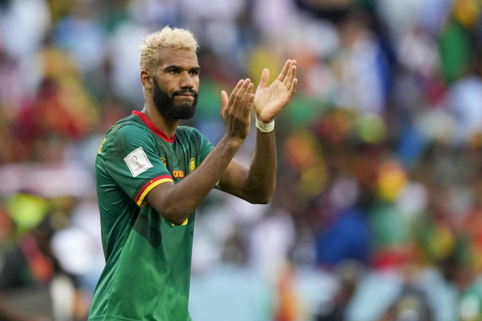 Cameroon's Eric Maxim Choupo-Moting greets supporters after the World Cup group G soccer match between Cameroon and Serbia, at the Al Janoub Stadium in Al Wakrah, Qatar, Monday, Nov. 28, 2022. (AP Photo/Frank Augstein)