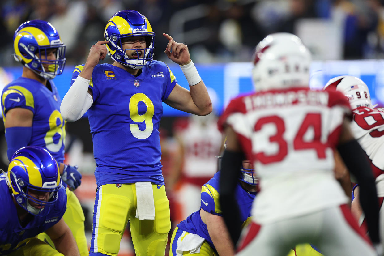 INGLEWOOD, CALIFORNIA - JANUARY 17: Matthew Stafford #9 of the Los Angeles Rams reacts at the line of scrimmage against the Arizona Cardinals during the third quarter in the NFC Wild Card Playoff game at SoFi Stadium on January 17, 2022 in Inglewood, California. (Photo by Harry How/Getty Images)