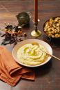 <p>Infuse milk with the flavors of fresh thyme and parsley to upgrade a crowd-favorite Thanksgiving side.</p><p><em><a href="https://www.goodhousekeeping.com/food-recipes/a14963/garlicky-herb-mashed-potatoes-recipe-ghk0313/" rel="nofollow noopener" target="_blank" data-ylk="slk:Get the recipe for Herbed Mashed Potatoes »;elm:context_link;itc:0;sec:content-canvas" class="link ">Get the recipe for Herbed Mashed Potatoes »</a></em> </p>