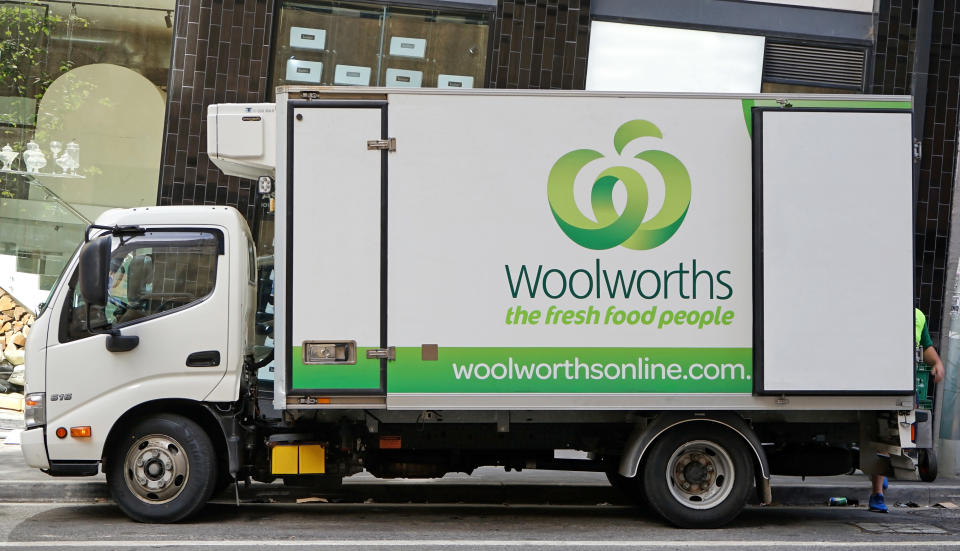 Woolworths delivery truck outdoors on street