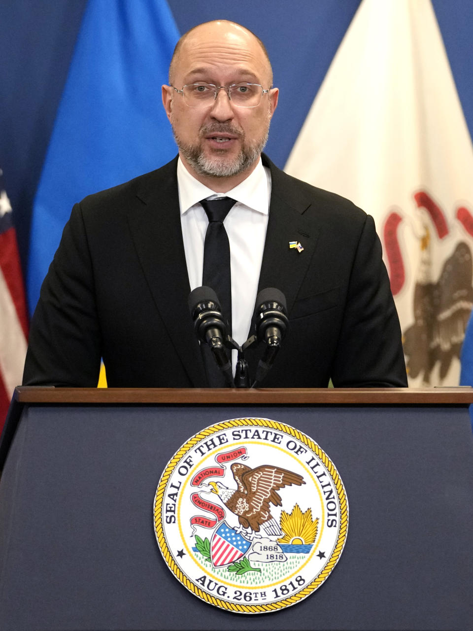 Ukrainian Prime Minister Denys Shmyhal speaks at a news conference in Chicago, Tuesday, April 16, 2024. Ukrainian Prime Minister Shmyhal, Illinois Governor J.B. Pritzker, and U.S. Special Representative for Ukraine's Economic Recovery Penny Pritzker delivered joint remarks recognizing the Illinois-Ukraine partnership. (AP Photo/Nam Y. Huh)