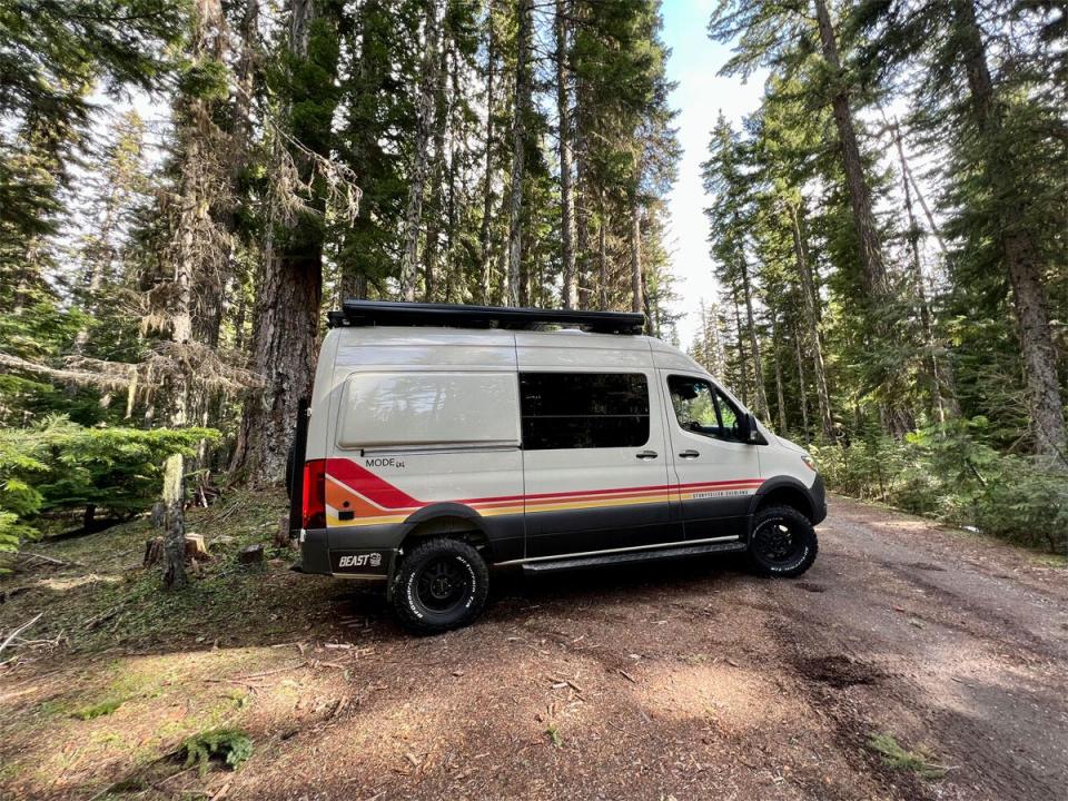 outside of camper van in woods