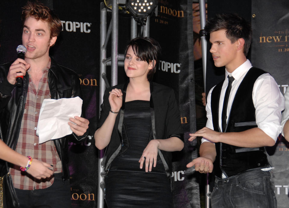 Kristen with Robert Pattinson and Taylor Lautner