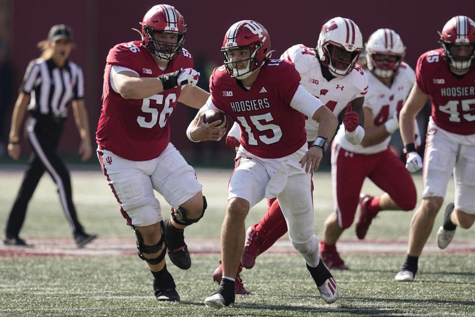 Indiana quarterback Brendan Sorsby (15) runs during the first half of an NCAA college football game against Wisconsin, Saturday, Nov. 4, 2023, in Bloomington, Ind. (AP Photo/Darron Cummings)