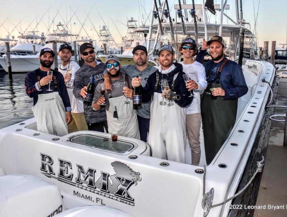 The crew of the Goombay Smash/Remix celebrate their victory in the 85th annual Silver Sailfish Derby.