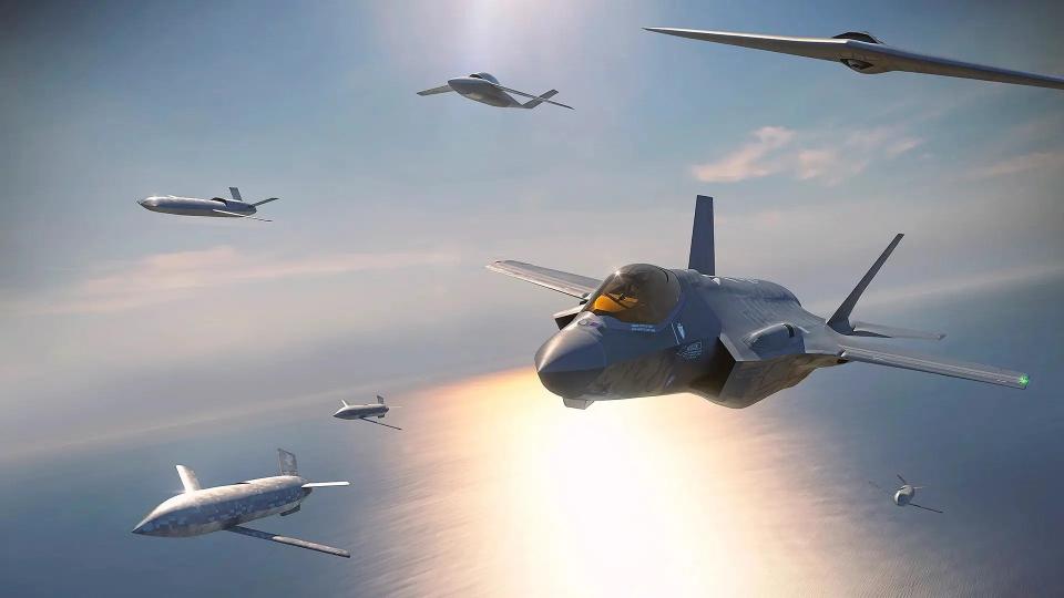 Concept art depicting an F-35 Joint Strike Fighter flying together with various tiers of drones. <em>Lockheed Martin Skunk Works</em>