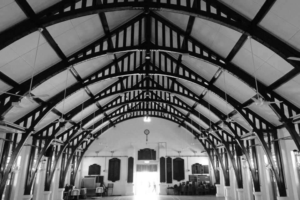 AWESTRUCK. Many a freshie, like me in 1966, find these arches of the Pinhorn Hall intimidating and an awesome sight. They never fail to impress — even now. I like to see the hall empty with its main door wide open, like a grand tunnel welcoming activity. From resplendent speech days to the rigours of badminton practice. From timeless Shakespearean plays to captivating fashion shows. — Picture and caption courtesy of Lim Siang Jin. 