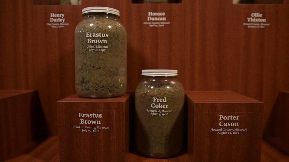 Jars of soil taken from the sites of lynchings accompany the names of victims in The Room of Remembrance at Black Archives of Mid-America.