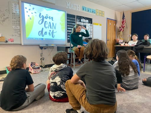 KOIN 6 anchor Emily Burris reads to students at John Wetten Elementary School in Gladstone on Mar. 1, 2024 (KOIN)