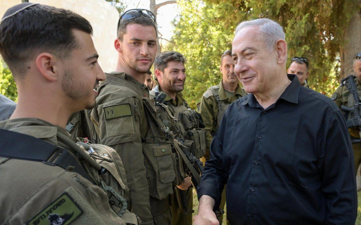 Benjamin Netanyahu meets troops on a tour of Israel's northern border with Lebanon