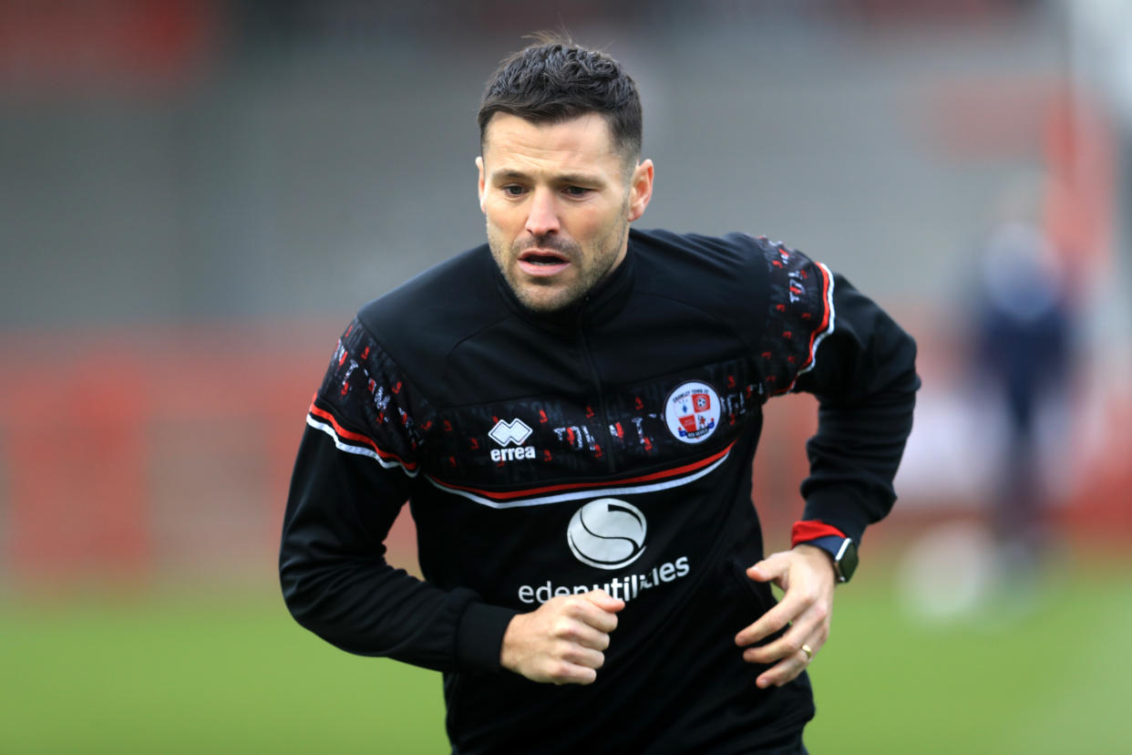 Crawley Town's Mark Wright warms up prior to during the Emirates FA Cup third round match at the People's Pension Stadium, Crawley.