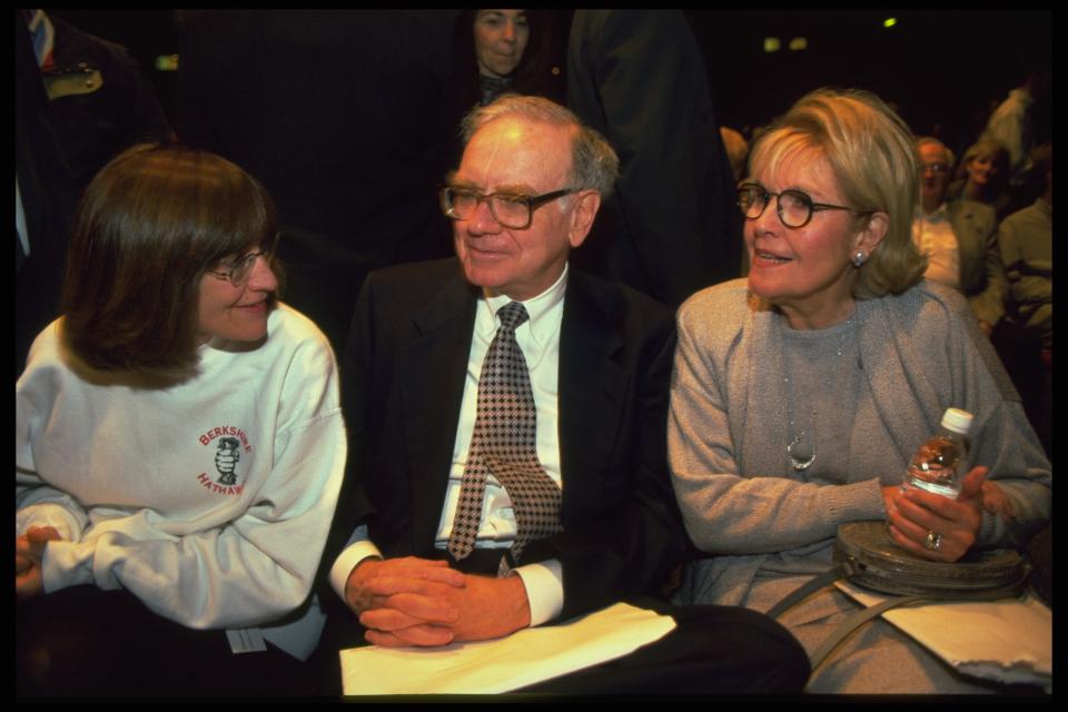 Warren Buffett pictured in 1997 with his daughter Susan (left) and then-wife, Susan Thompson Buffett (right), who died in 2004.