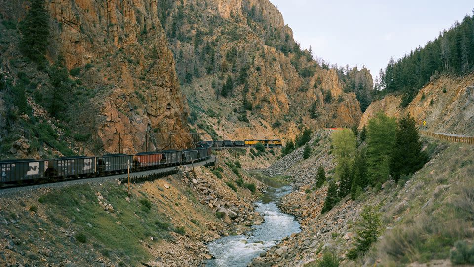 Kurland often photographs trains within the American landscape, winding in and out of it or disappearing into its vastness. - Justine Kurland