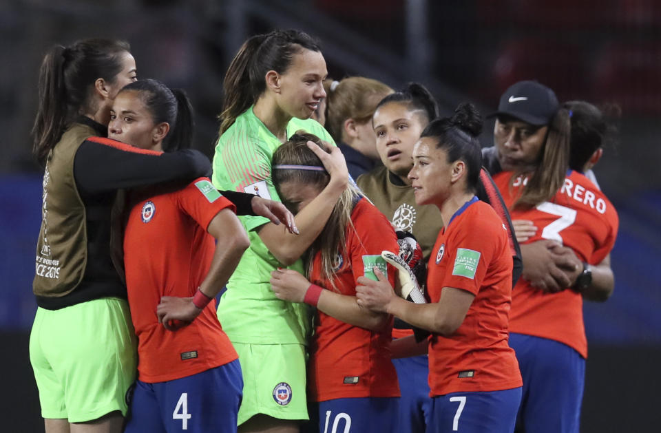 Chile players react at the end of the Women's World Cup Group F soccer match between Thailand and Chile at the Roazhon Park in Rennes, France, Thursday, June 20, 2019. Chile won 2-0, one goal short of the win by three goals difference needed to qualify for the next round. (AP Photo/David Vincent)