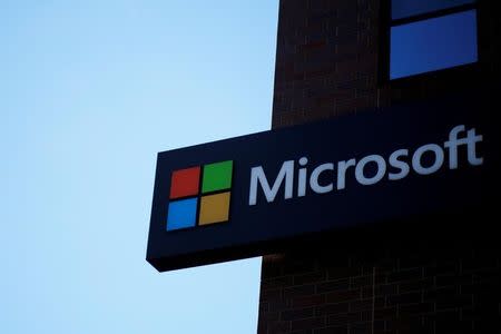 FILE PHOTO: A sign marks the Microsoft office in Cambridge, Massachusetts, U.S. on January 25, 2017. REUTERS/Brian Snyder/File Photo