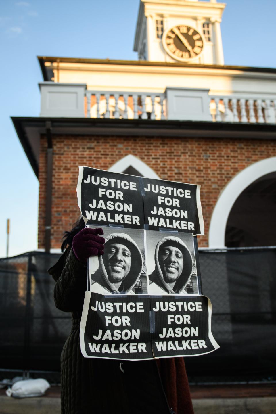 Demonstrators march through downtown Fayetteville during a Justice for Jason Walker demonstration on Thursday, Jan. 13, 2022. Jason Walker, 37, was shot and killed on Saturday by an off-duty Cumberland County Sheriff’s deputy.