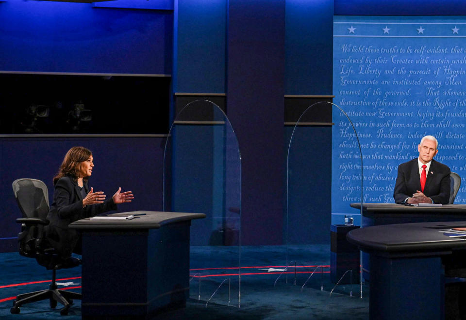 Kamala Harris and Mike Pence. (Eric Baradat / AFP - Getty Images file)