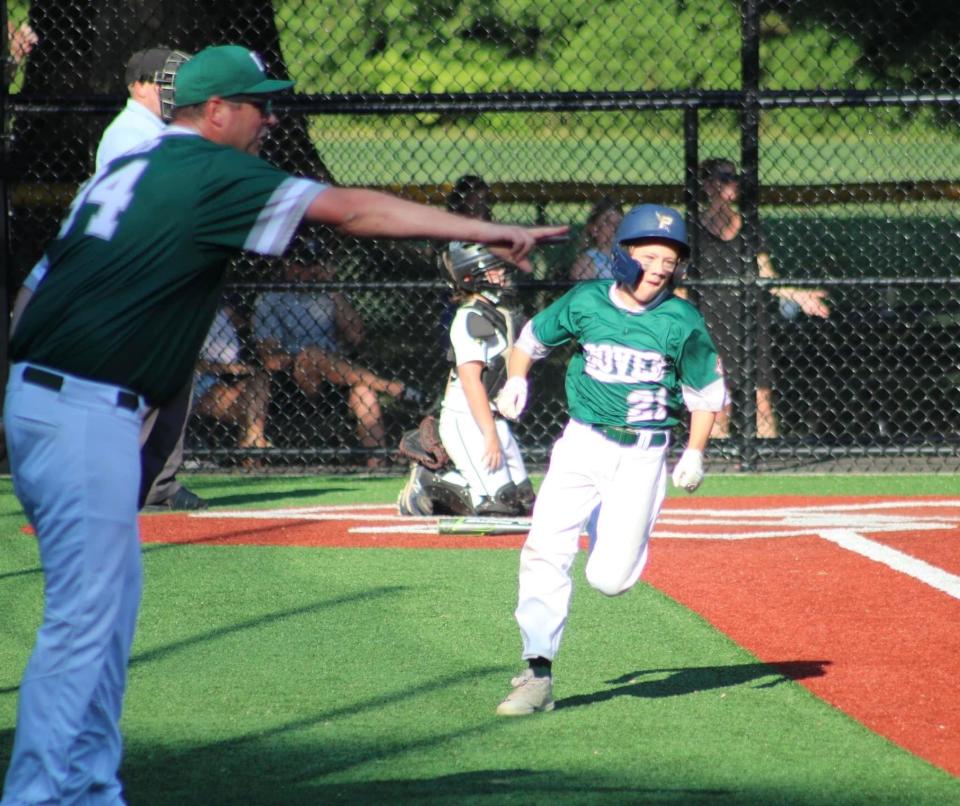 Dover's Rhett Reed looks to round first base and head to second during a 12-0 win over Easton-Redding, Connecticut in the 11U Cal Ripken New England regional tournament Wednesday, July 20, 2022 in New Canaan, Connecticut.