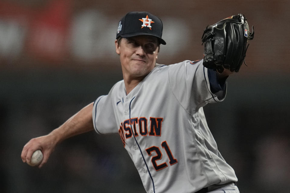 Houston Astros starting pitcher Zack Greinke throws during the first inning in Game 4 of baseball's World Series between the Houston Astros and the Atlanta Braves Saturday, Oct. 30, 2021, in Atlanta.(AP Photo/Ashley Landis)