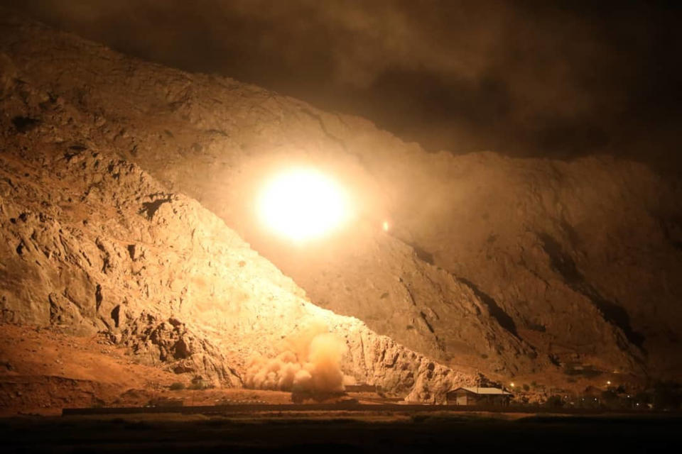 In this photo released on Monday, Oct. 1, 2018, by the Iranian Revolutionary Guard, a missile is fired from city of Kermanshah in western Iran targeting the Islamic State group in Syria. Iran's paramilitary Revolutionary Guard said Monday it launched ballistic missiles into eastern Syria targeting militants it blamed for a recent attack on a military parade. (Sepahnews via AP)