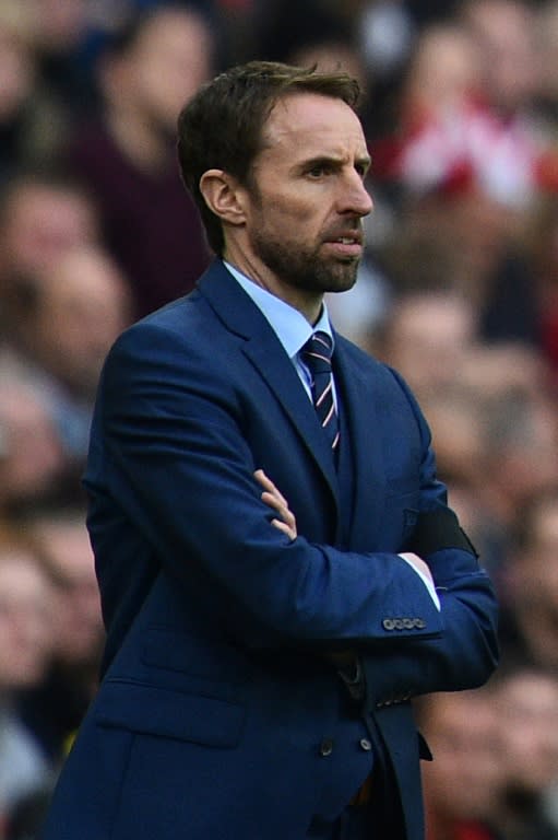 England's manager Gareth Southgate watches his players from the touchline during their Russia 2018 World Cup qualification match against Lithuania, at Wembley Stadium in London, on March 26, 2017