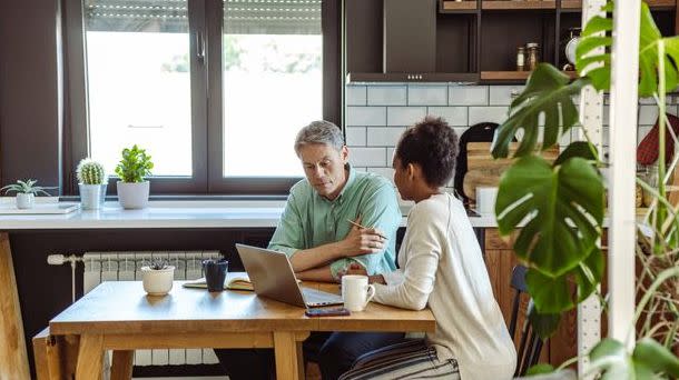 A couple looks over their capital gains tax liability from selling their home.