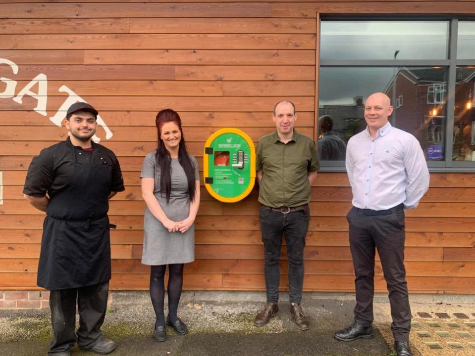 Bury Times: The new defibrillator at Goats Gate pub 