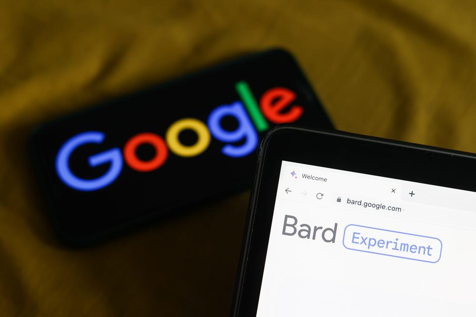 Google logo displayed on a phone screen and Bard website displayed on a laptop screen are seen in this illustration photo taken in Krakow, Poland on March 21, 2023.