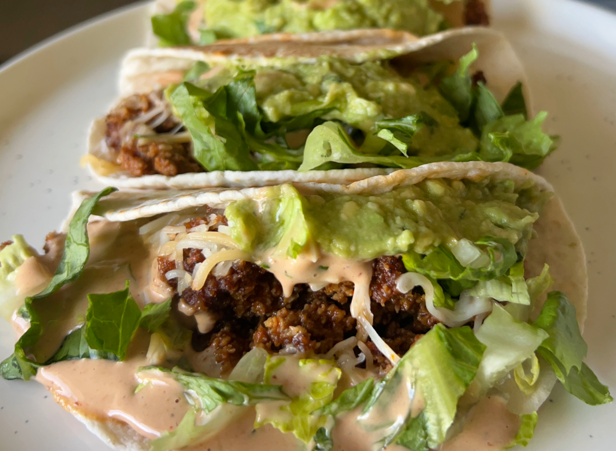 qdoba beef tacos on a plate.