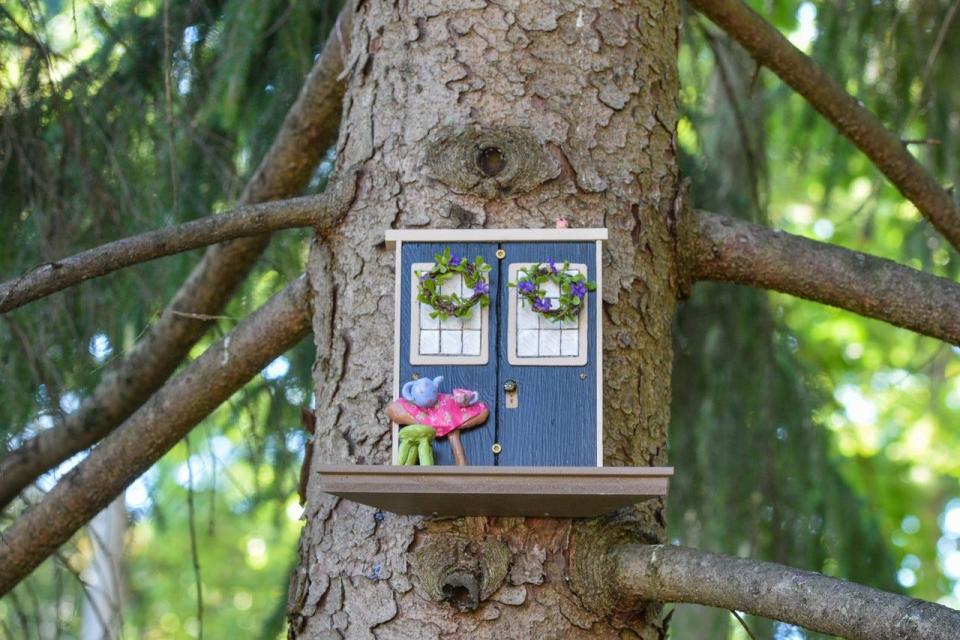 This squirrel door created by The Summer Kitchen hangs in a Norway Spruce near the entrance to Spiegel Grove. It is one of 10 squirrel doors hidden throughout the grounds.