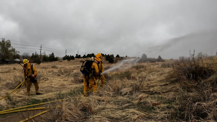 Colorado Springs fire crews worked with each other to help navigate the wildland drill training.