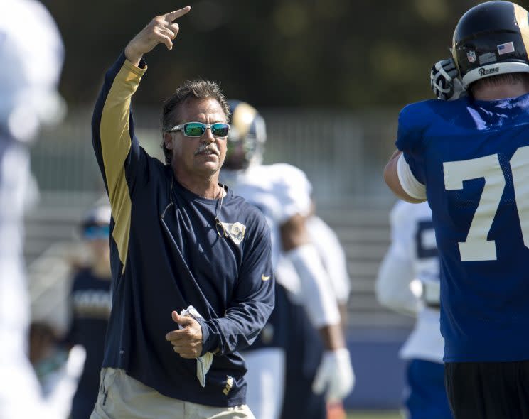 Jeff Fisher sees 11-5 or better in his future. Really. (AP)