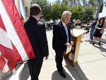 Torrance Mayor Frank Scotto leaves a news conference at Torrance City Hall in Torrance, California April 28, 2014, after reacting to an announcement by Toyota Motor Sales U.S.A. that it is relocating its headquarters from Torrance to Texas. REUTERS/Kevork Djansezian