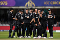 The New Zealand side react as Jason Roy survives the subsequent review. (Photo by Gareth Copley-IDI/IDI via Getty Images)