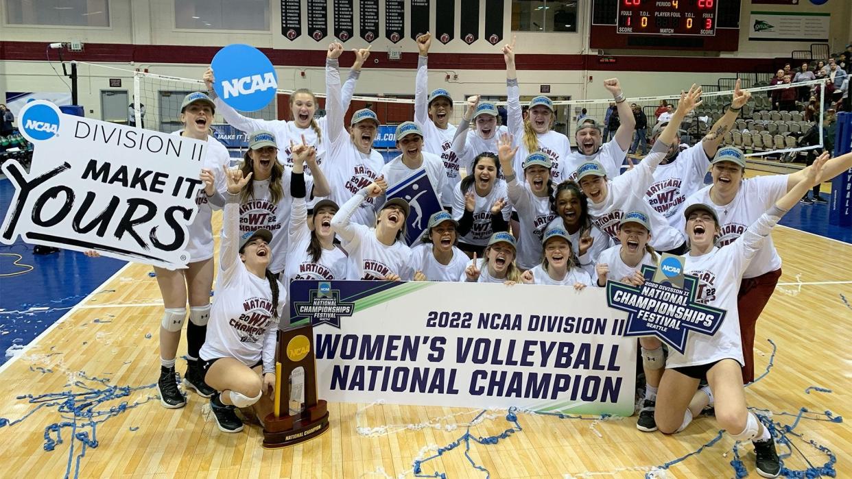 The West Texas A&M volleyball team celebrates winning the national championship in Seattle on Saturday, December 3, 2022.