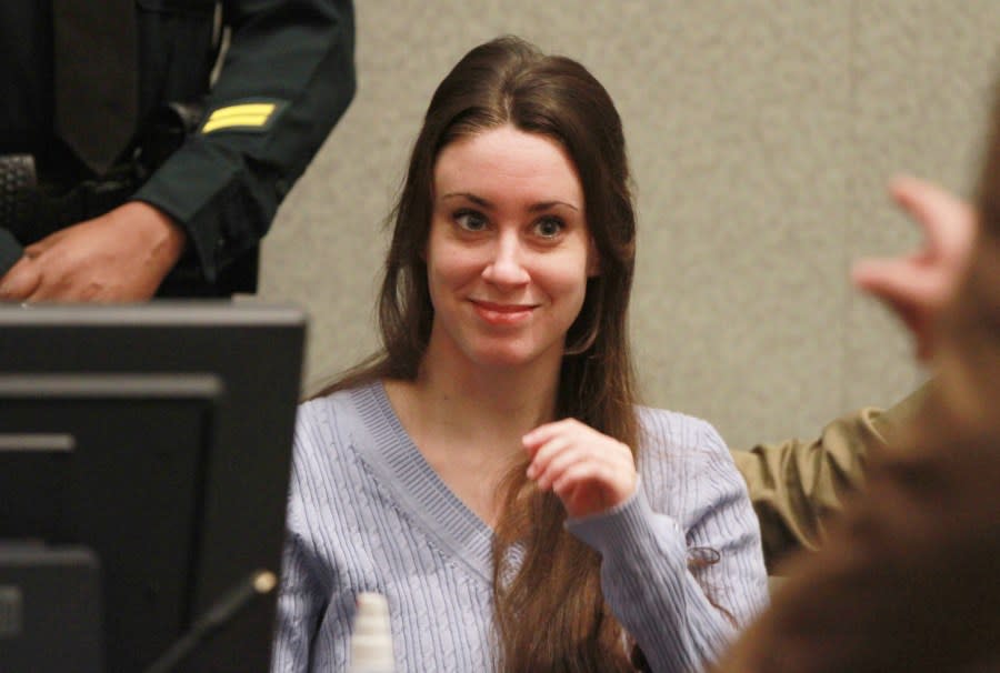 ORLANDO, FL – JULY 07: Casey Anthony smiles before the start of her sentencing hearing on charges of lying to a law enforcement officer at the Orange County Courthouse July 7, 2011 in Orlando, Florida. Anthony was acquitted of murder charges on July 5, 2011 but will serve four, one-year sentences on her conviction of lying to a law enforcement officer. She will be credited for the nearly three-years of time served and good behavior and will be released July 13. (Photo by Joe Burbank-Pool/Getty Images)